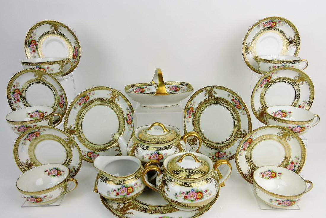 Noritake tea/dessert set, 23 pieces;: tray, teapot, cream, sugar, basket, 6 - 7 3/4" plates, 6 cups, 6 saucers