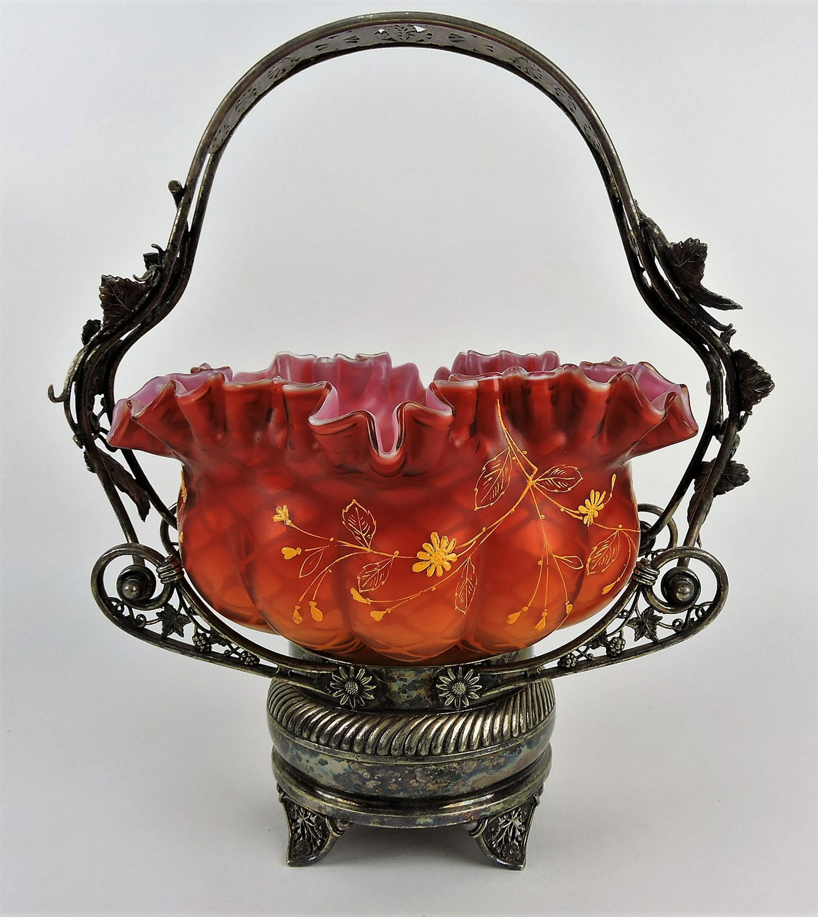 Monumental Mt. Washington amberina: diamond quilted pink cased glass brides basket with floral enamel, outstanding color, 15"h, 12 1/2"w, bowl 11"d, Wm Rogers silver plate frame with butterflies and leaves
