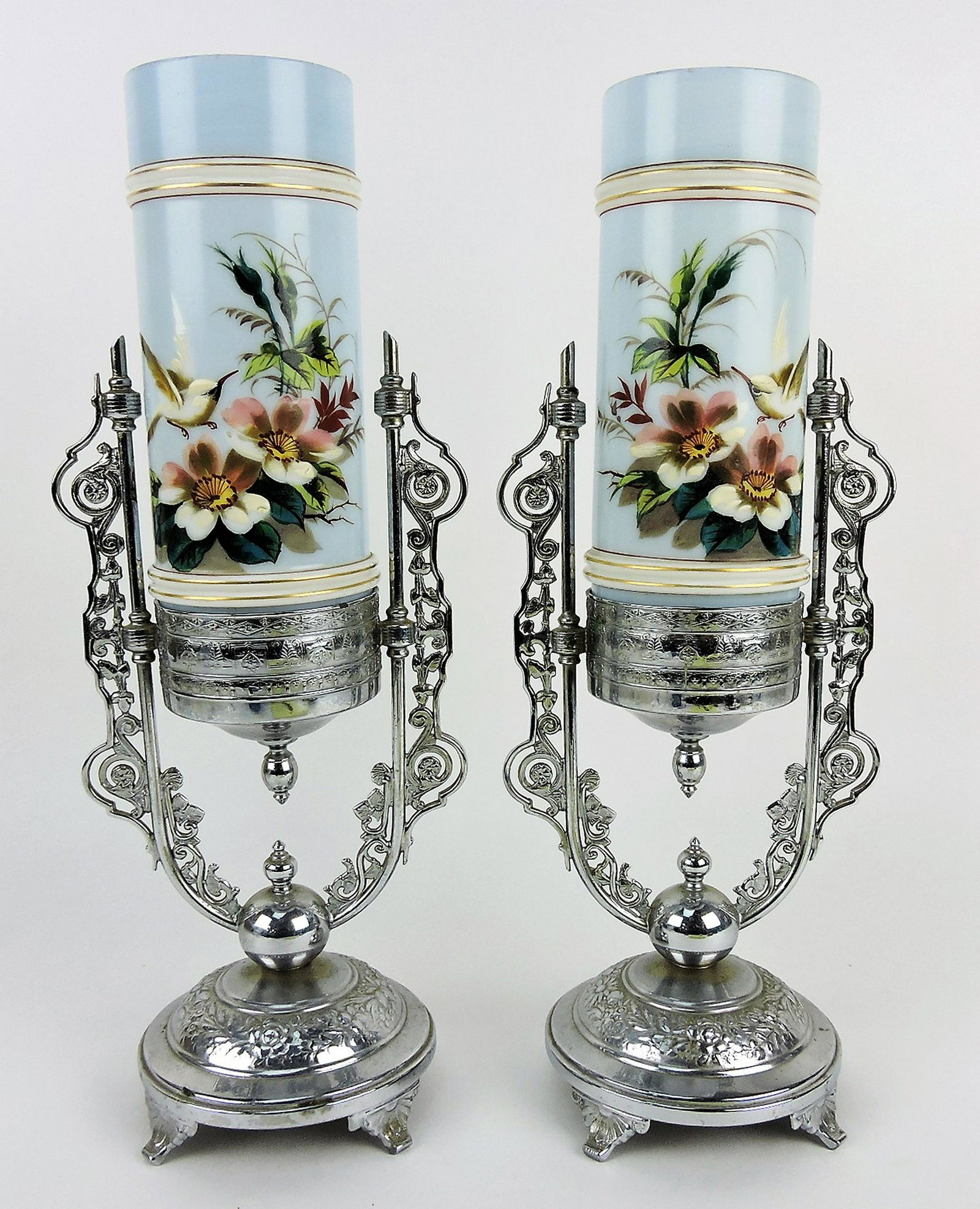 Victorian pair of glass mantle vases: in elaborate silver plate frames, 15", decorated with birds & flowers