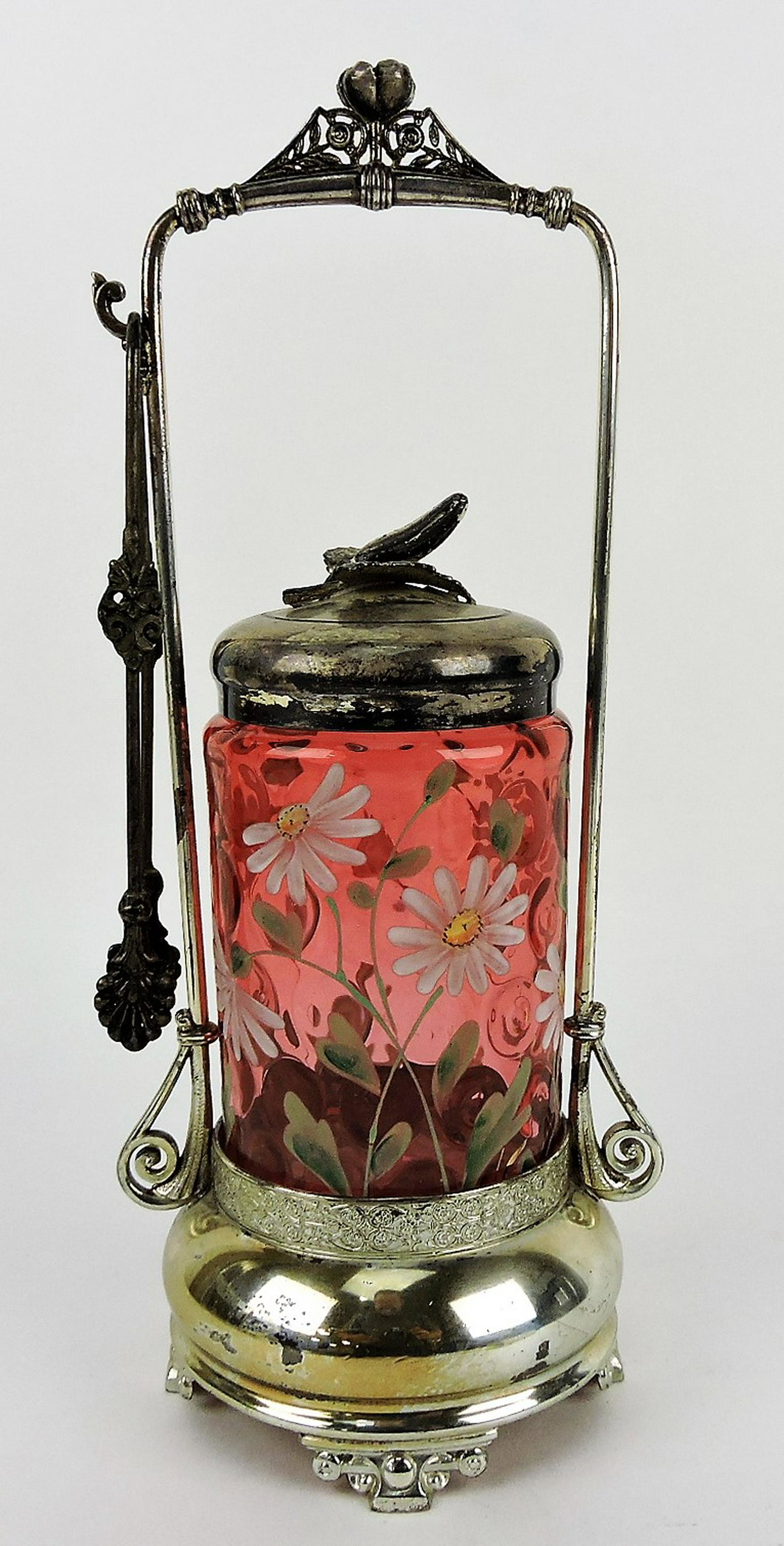 Victorian pickle castor with cranberry: floral enamel insert, pickle on lid, 12 1/2"