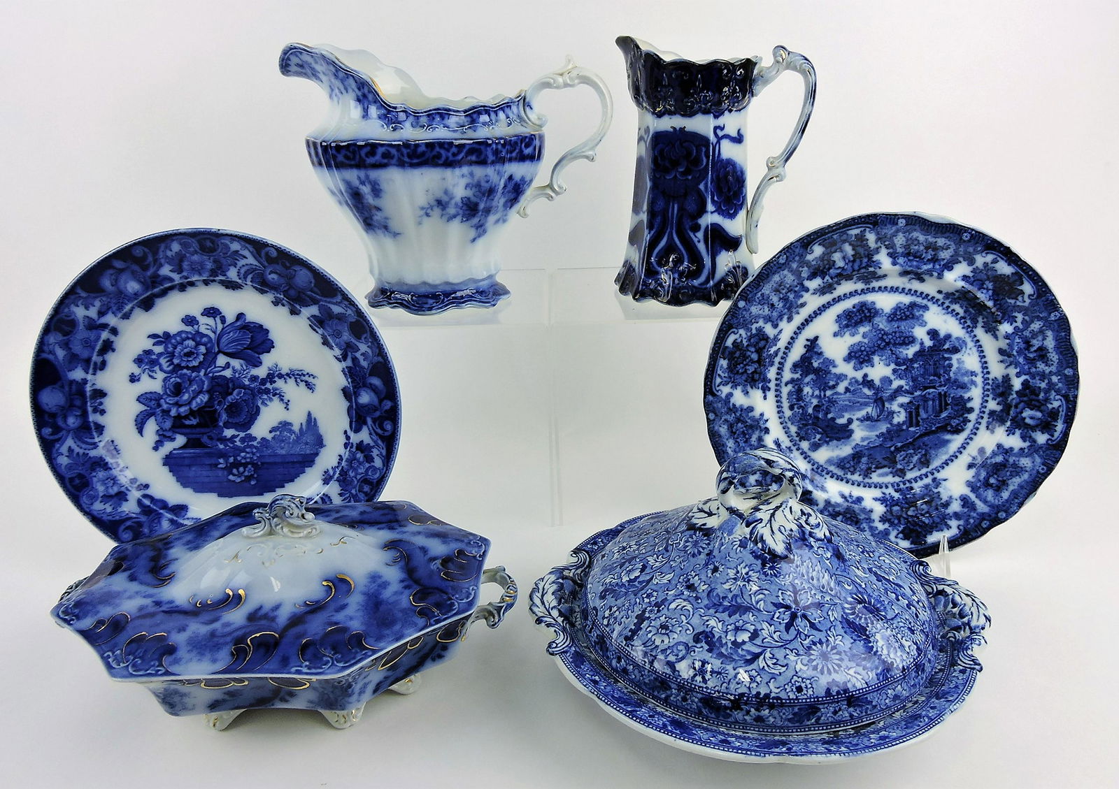 Flow Blue lot of 6 pieces; 2 pitchers,: 2 plates, 2 tureens, various condition