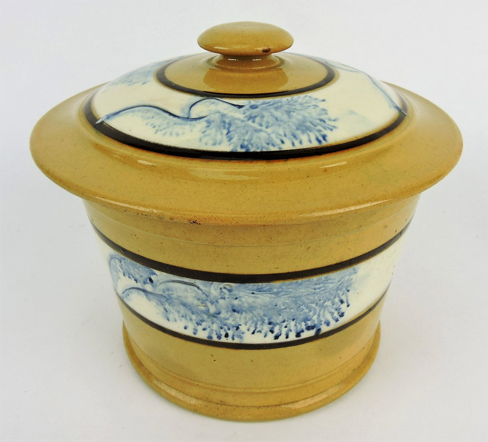 Mochaware yellow large covered: jar with blue seaweed, 7"h, chip to inside flange of lid