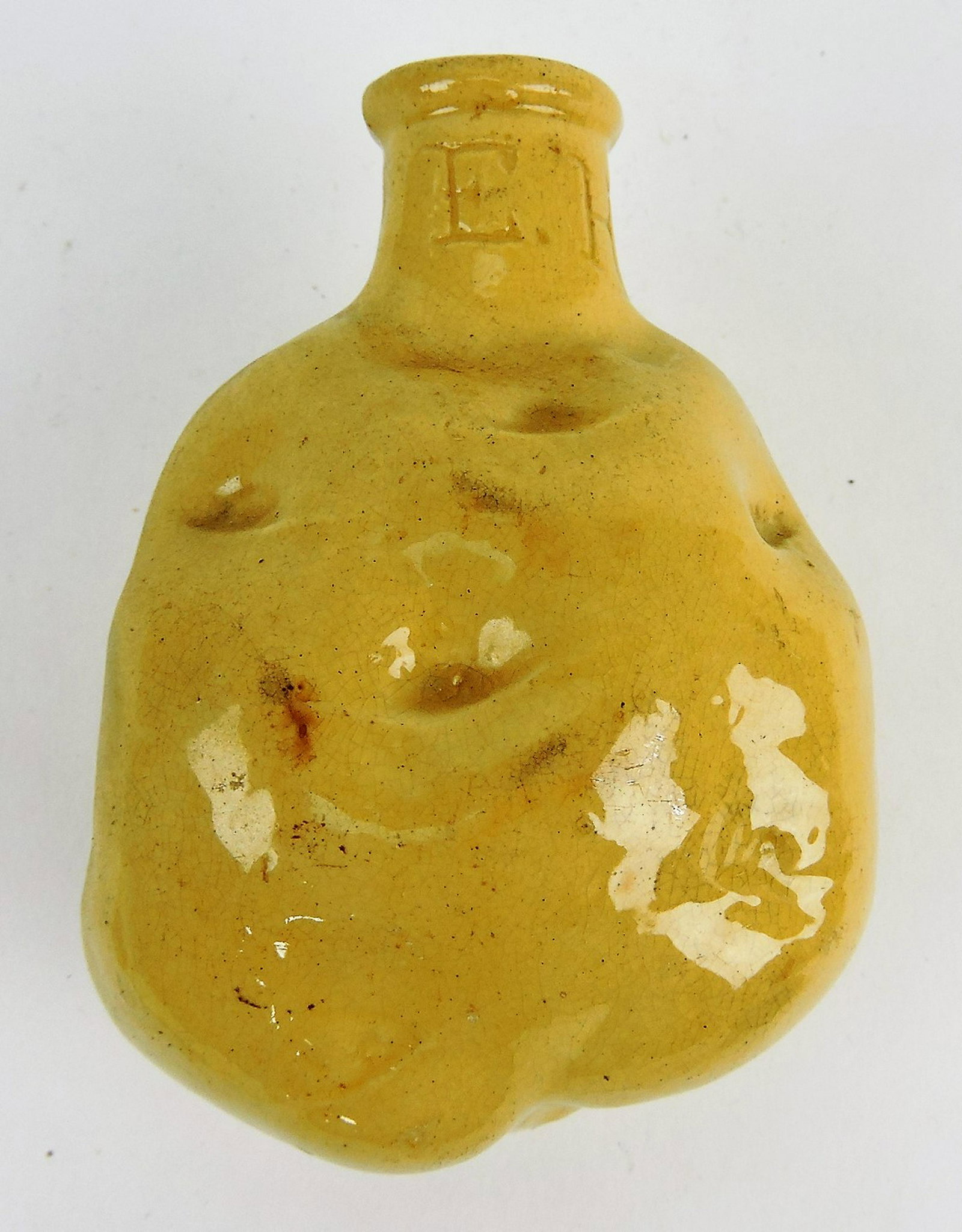 Yellow ware potato flask, signed: E.H., 4 3/4"