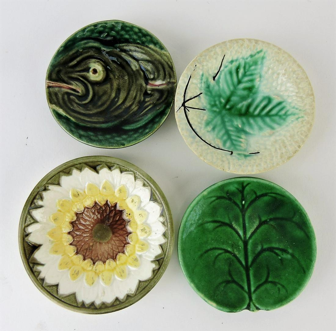 Majolica lot of 4 butterpats: .