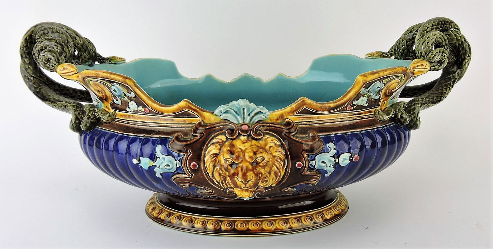 Sarregeumines majolica snake handled: center bowl with lion head on rim, 16 1/2"w, 7 1/2"w