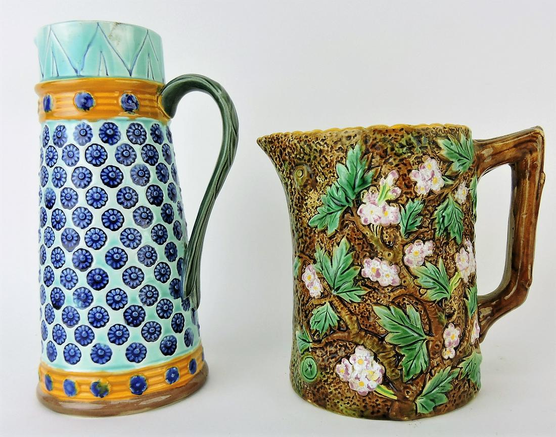Wedgwood majolica pitcher, 7 3/4",: and George Jones majolica rustic pitcher 5 1/2" (hairline)