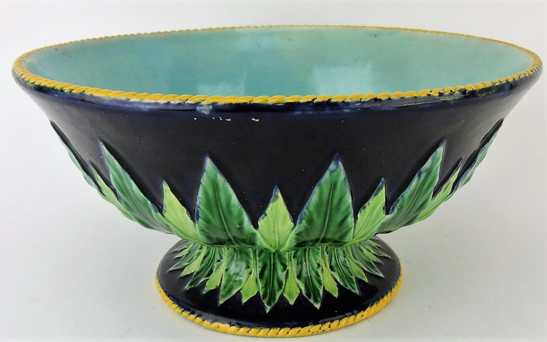 George Jones majolica cobalt: acanthus leaf footed bowl with yellow rope trim, 10"d, 5"h