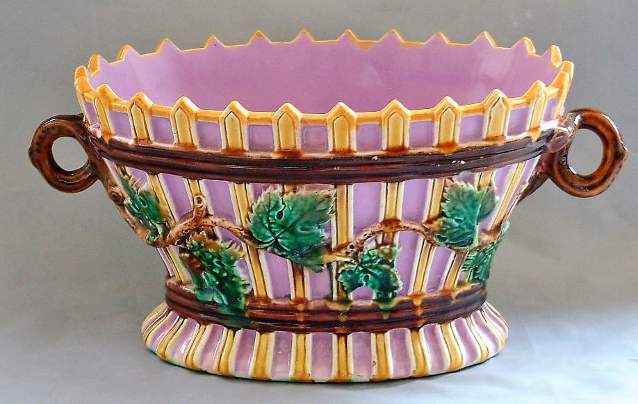 George Jones majolica basket with: vine and twig detail, rare pink ground, 12"