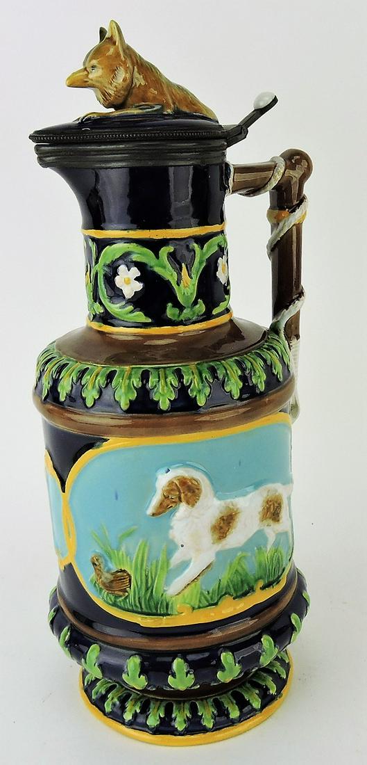 George Jones majolica cobalt: hunt jug with hunt scene on each side - fox with rabbit and dog with quail, fox lid, 12"