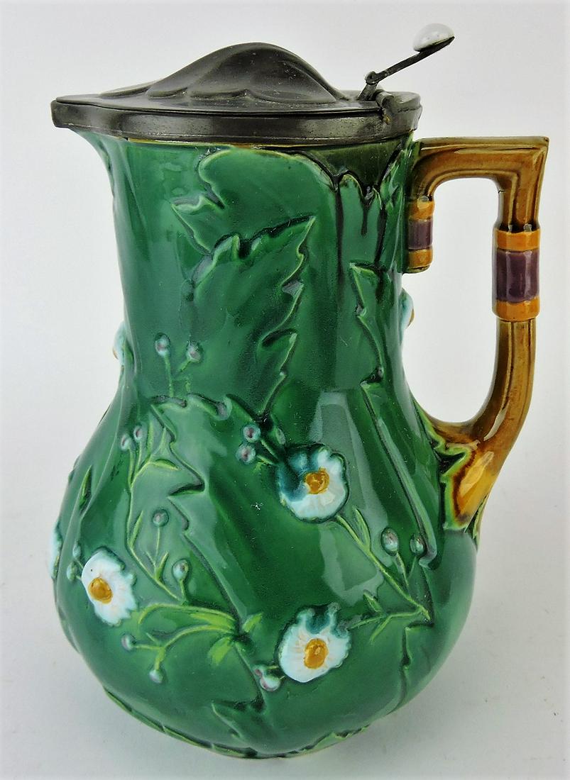 Minton majolica green leaf and: floral pitcher with pewter cup, 8"