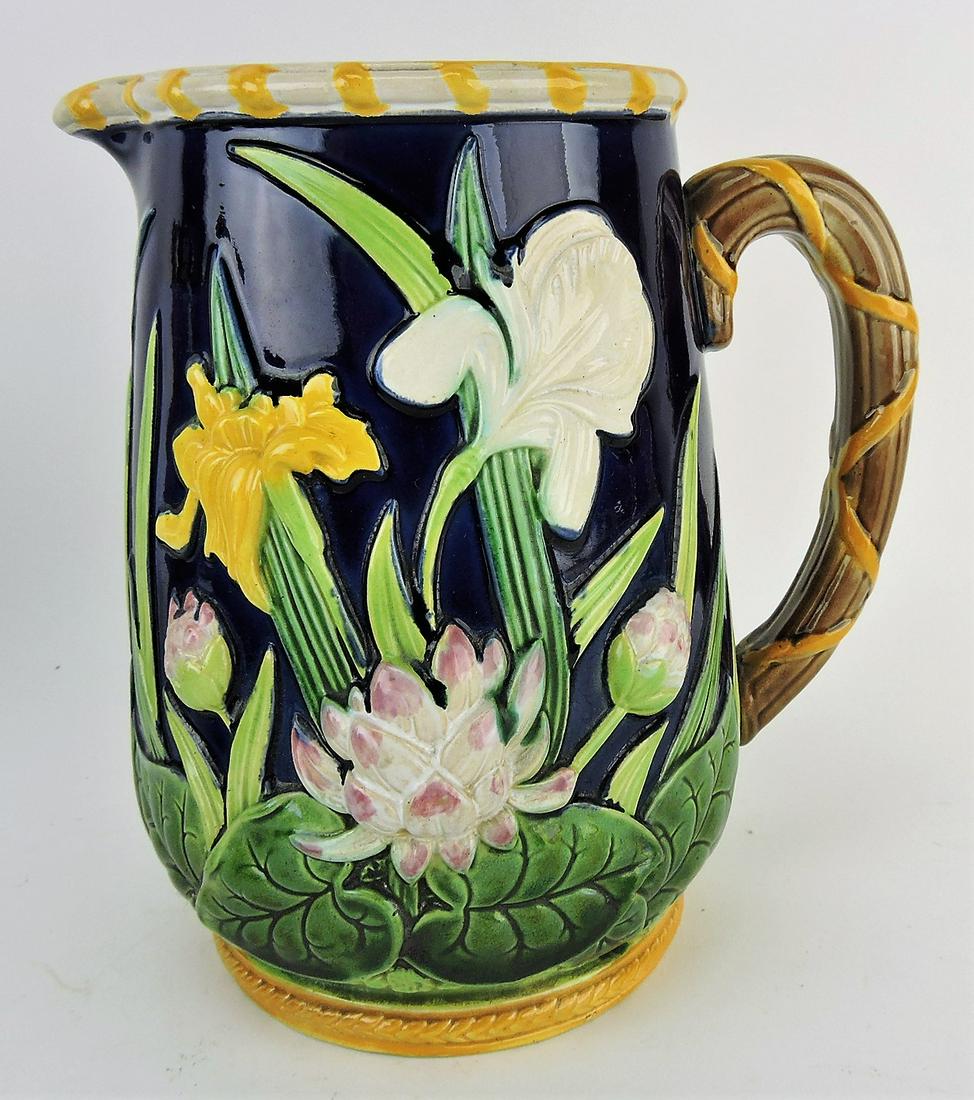 George Jones majolica cobalt: pitcher with iris and water lily, 8"