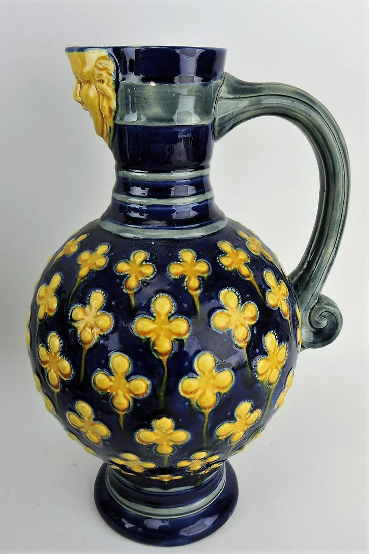 Minton cobalt majolica pitcher with: face spout, 11 1/2", nick to spout