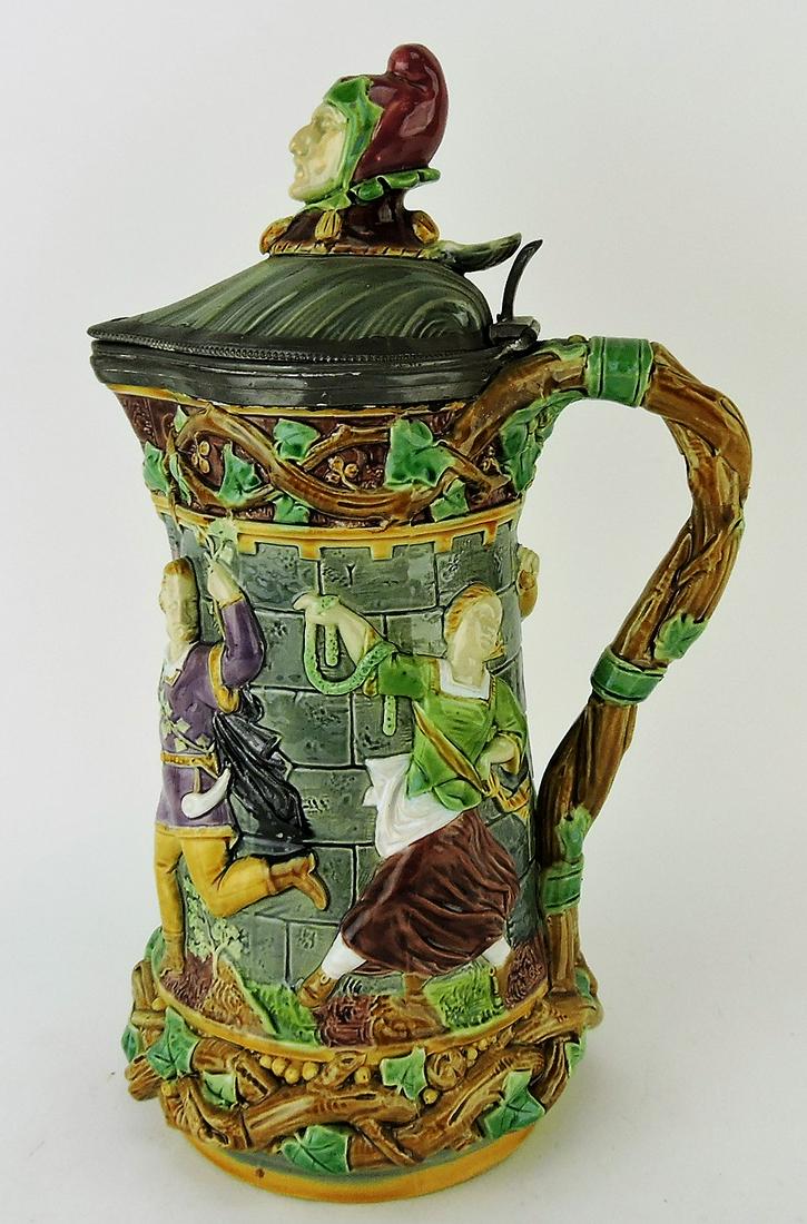Minton majolica tower jug with: jester finial, lid needs re-attached, 13"