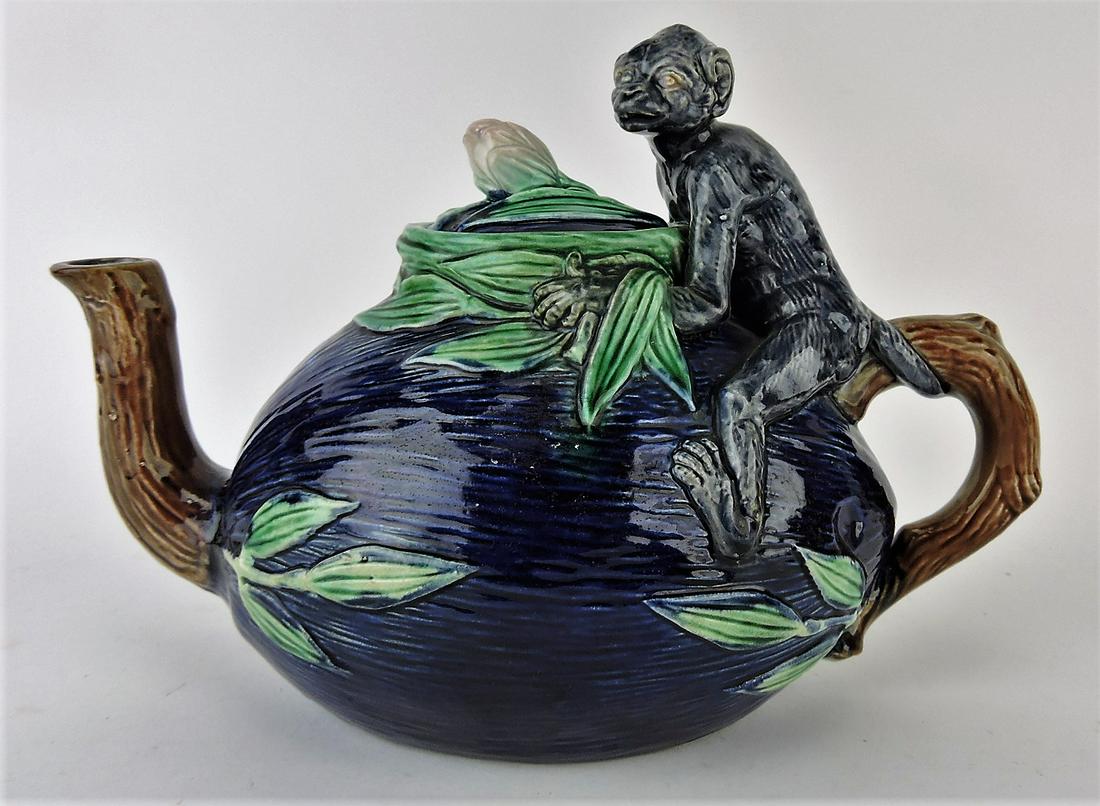Majolica cobalt coconut and monkey: figural teapot, 10 1/2"