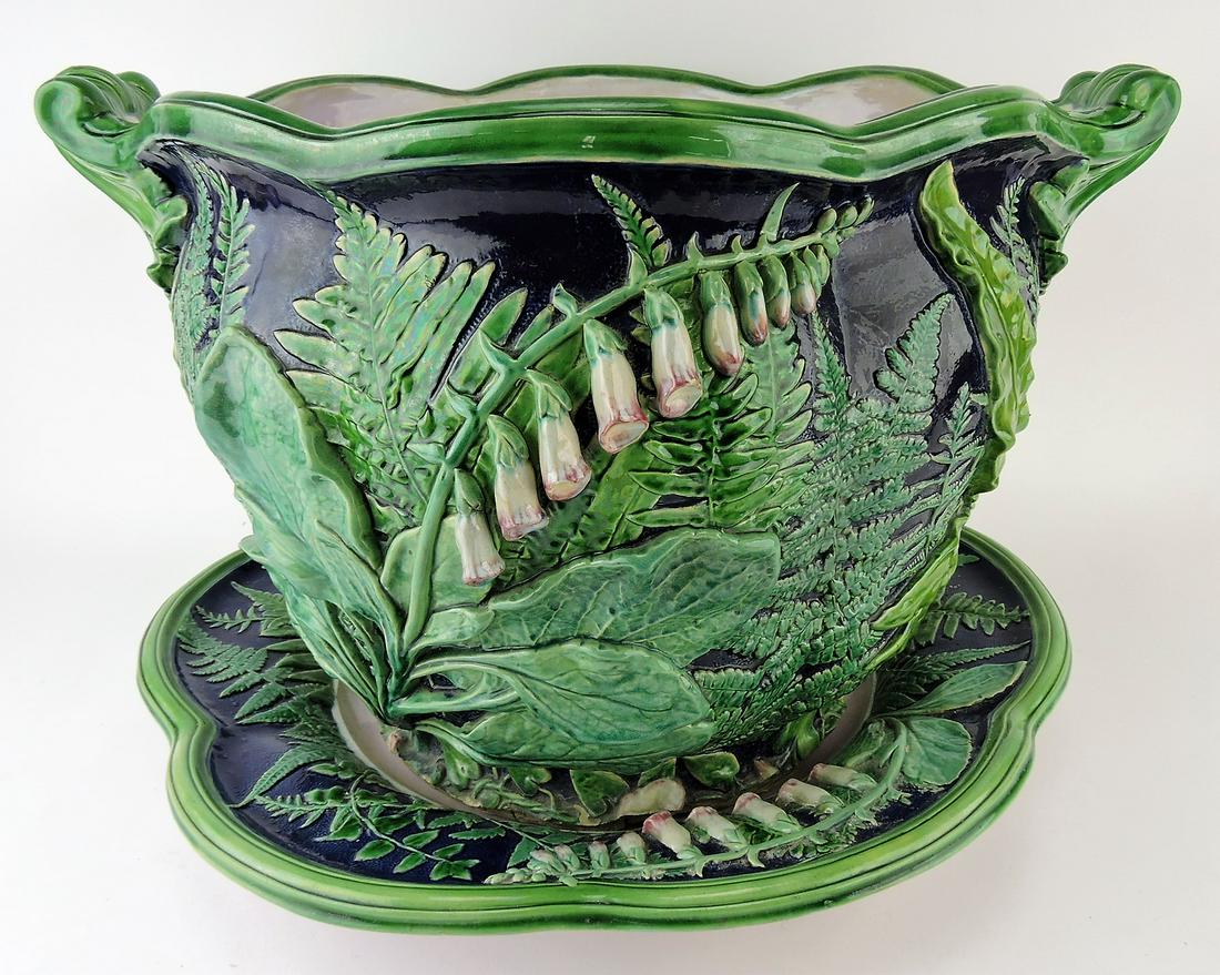 Minton majolica cobalt lily of the: valley, leaf, and fern large jardiniere and under tray, 22"w, 14 1/2"h, repair to under tray, chips around base rim of jardiniere, Karmason Collection