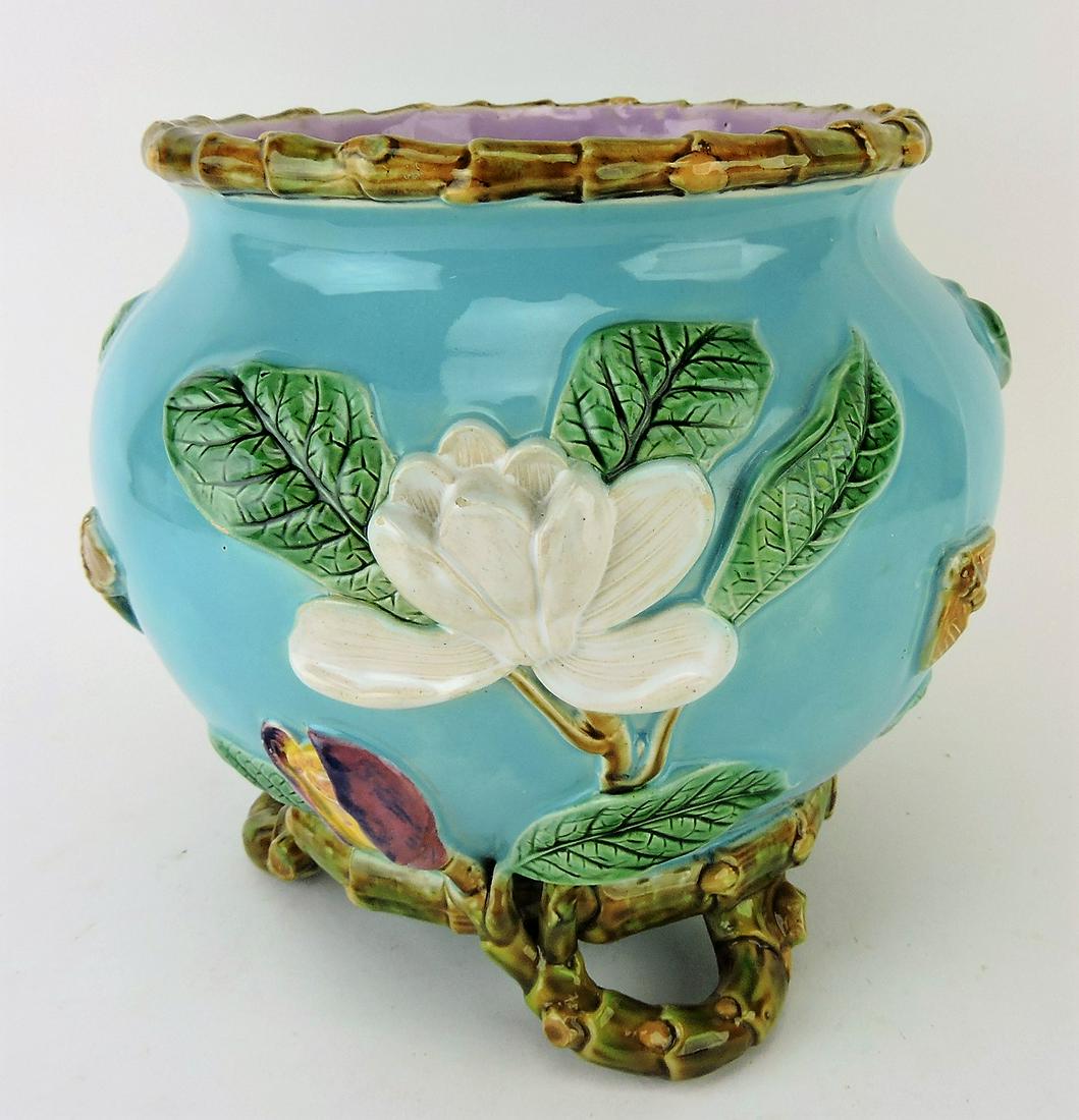 George Jones turquoise majolica: floral and bee jardiniere, 9"h, 10"w, professional repair to feet