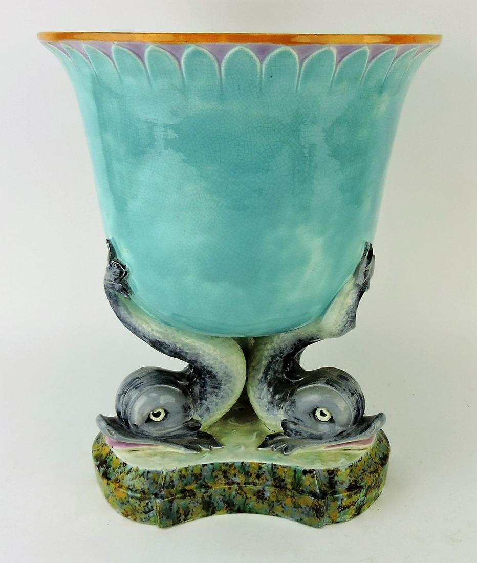 Holdcroft majolica jardiniere: supported by three dolphins, 13 1/2"h, 10 1/2"d