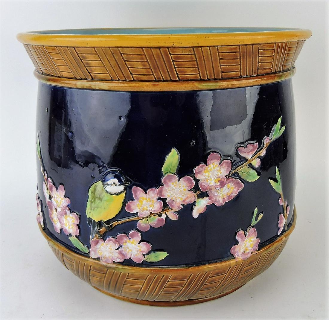 George Jones cobalt majolica: jardiniere with blue tit bird on floral branch, 10"h, 12"w