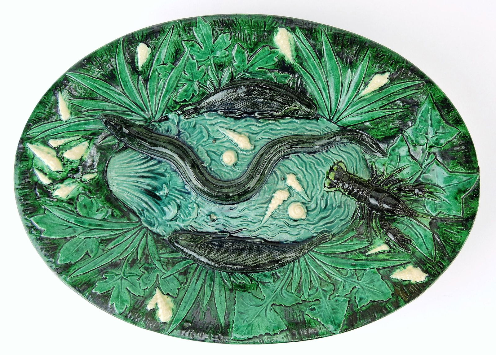 French Palissy ware majolica: oval tray with eel, fish, crawfish, shells, and other sealife, 12 1/2"
