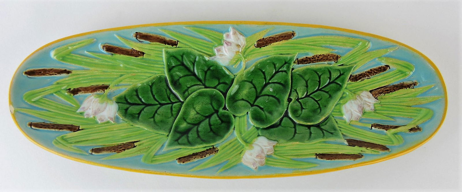 George Jones majolica pin tray: with water lily and cattails, 10 1/4", minor rim nick