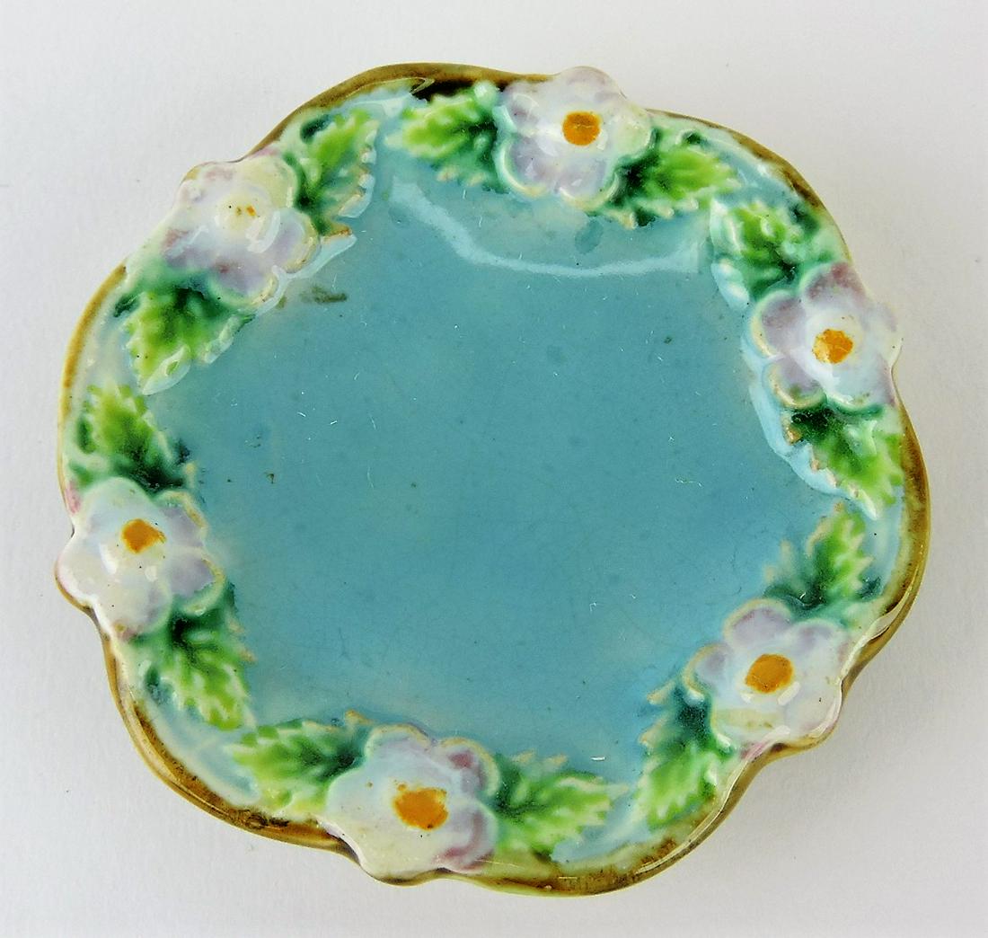 George Jones majolica butter pat: with strawberry blossoms