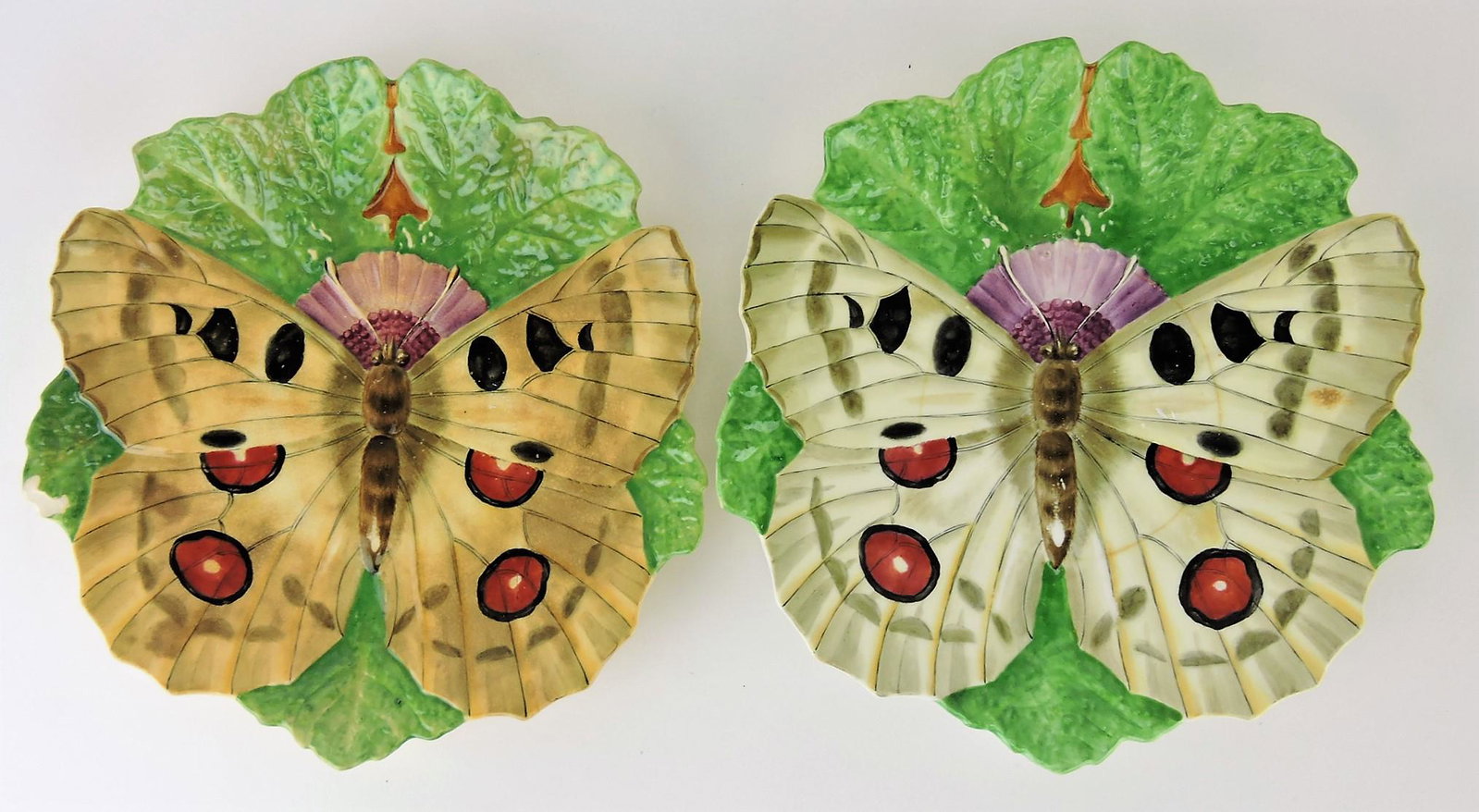 Minton porcelain lot of 2 - 9 1/2": butterfly plates, chip to one, hairline to one
