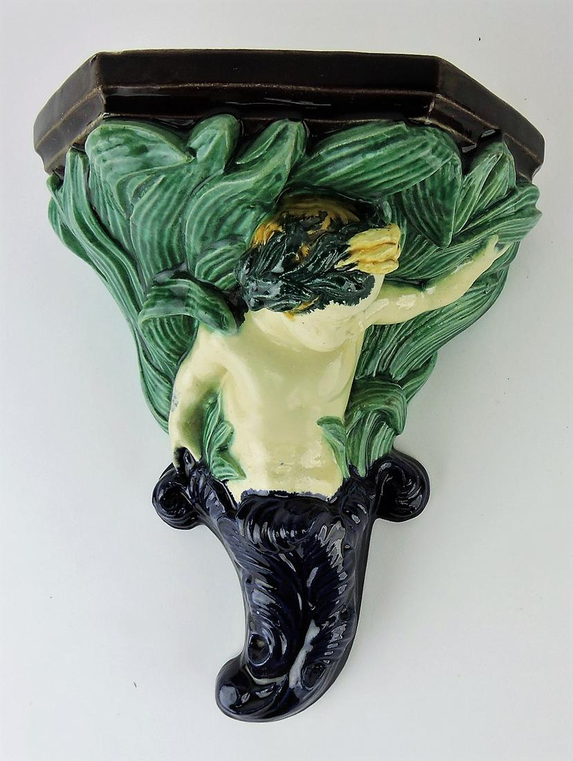 Thomas Sergent majolica merboy: bracket shelf, 9", professional hairline repair
