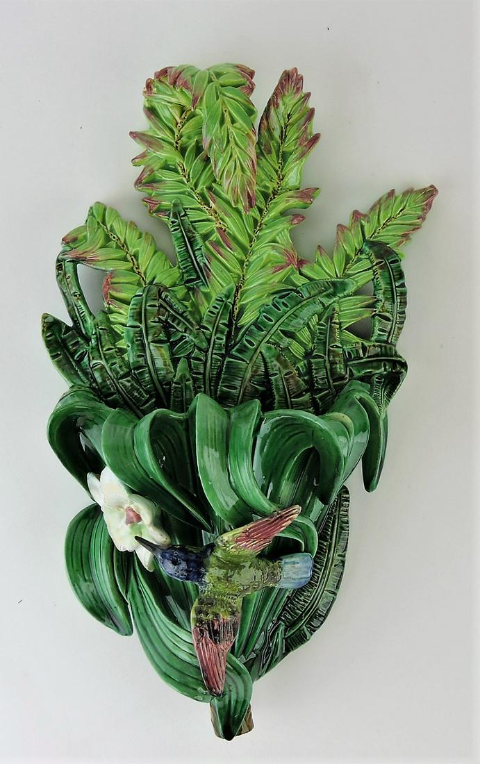 George Jones majolica hummingbird,: floral leaf, and fern wall pocket, 13", professional repair to leaf edges