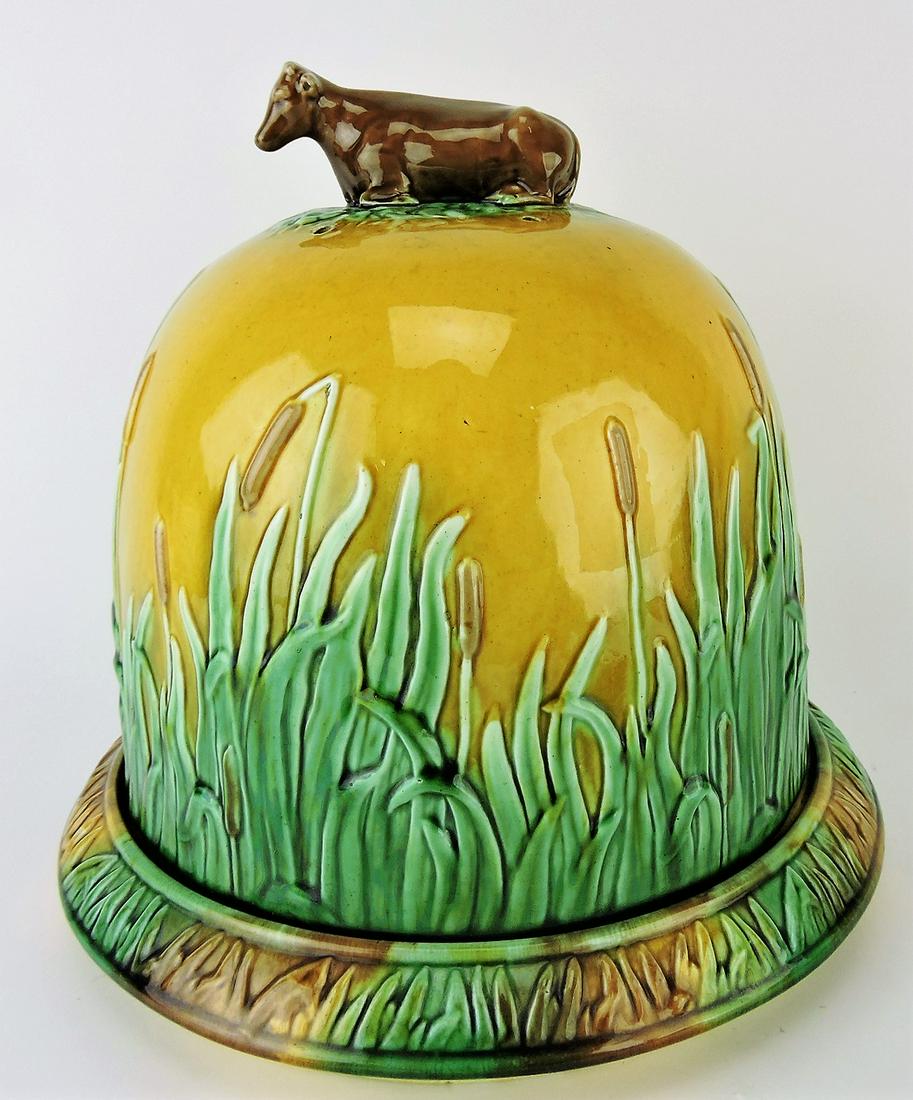 Adams & Bromley majolica cow and: cattail cheese keeper, 11"h, 11 1/2"d