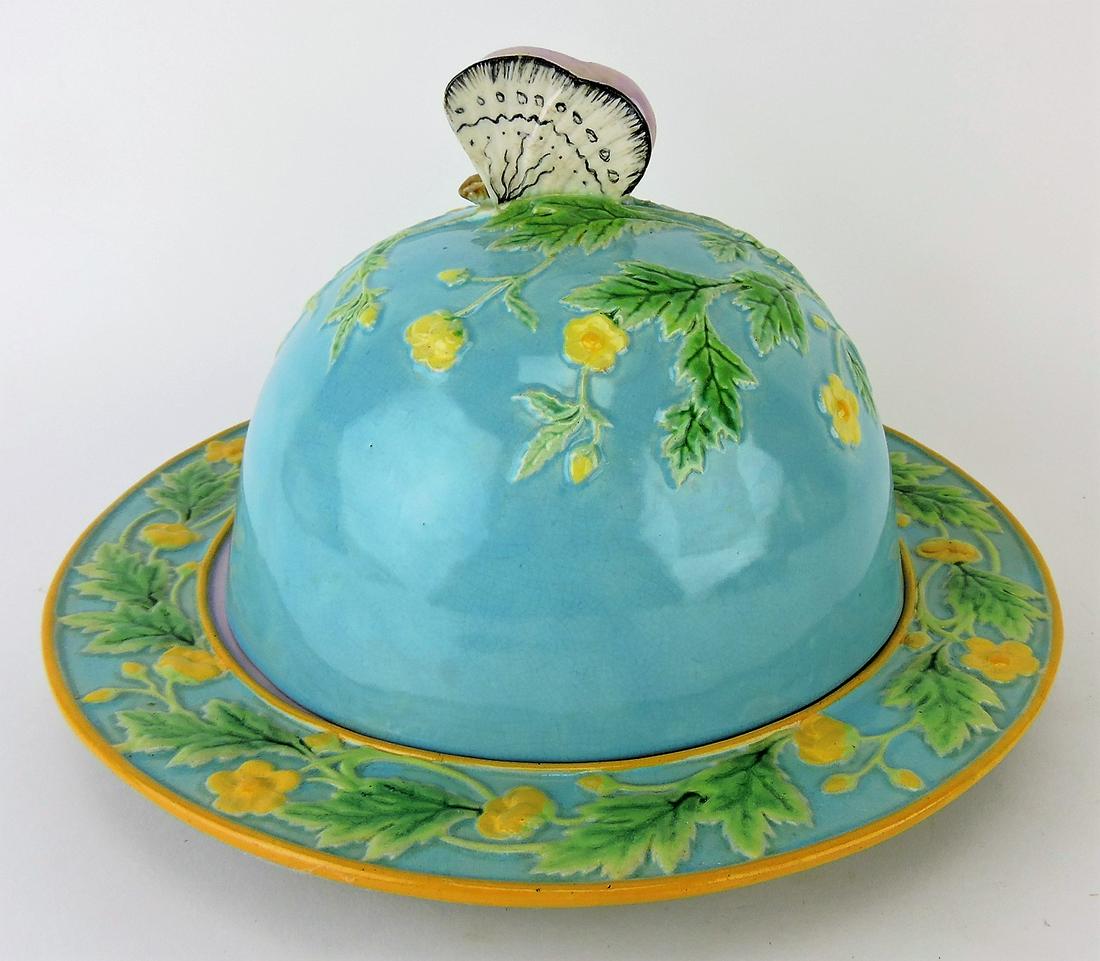 George Jones majolica turquoise: primrose muffin dish with butterfly handle, 7"h, 11 1/2"d