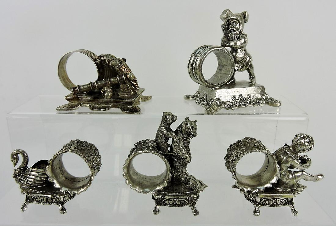 Contemporary lot of 5 figural napkin: rings