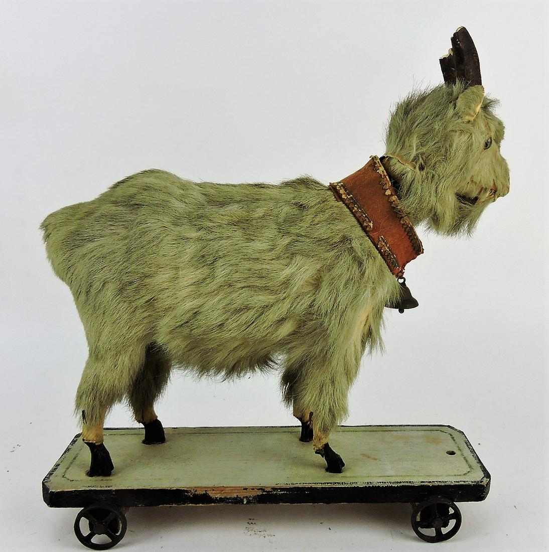 Early goat pull toy, loss of horn (1 of 2)