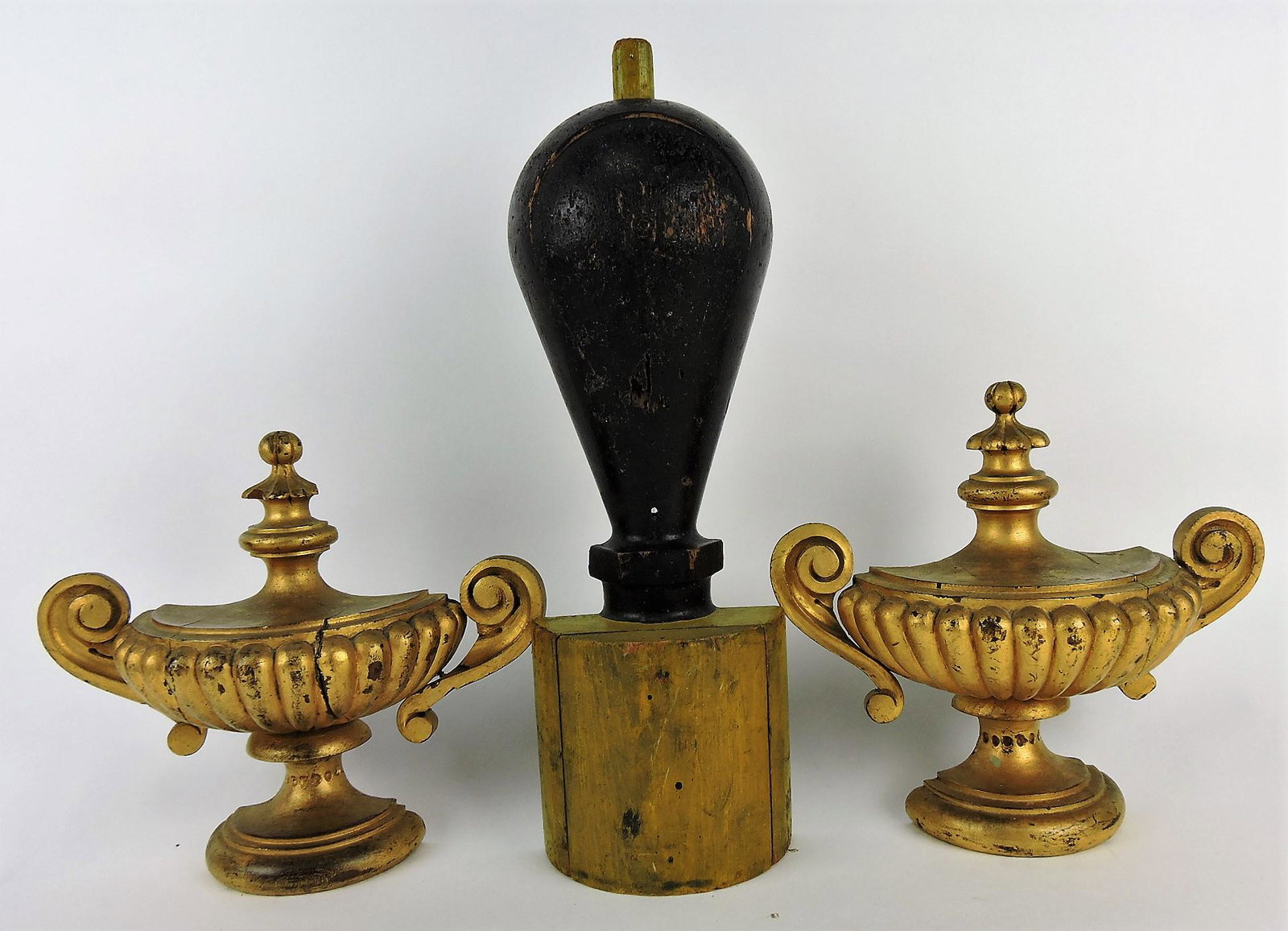 Pair of early wooden urn wall: pediments, 10 1/2"h, 12"w, and painted wood pediment, 19"