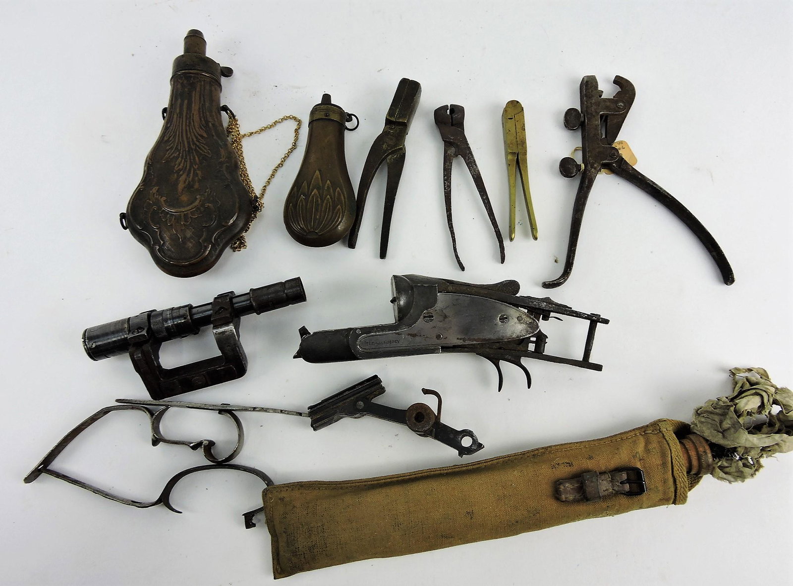 Lot of assorted gun related items; bullet: molds, powder flasks, scope, and more
