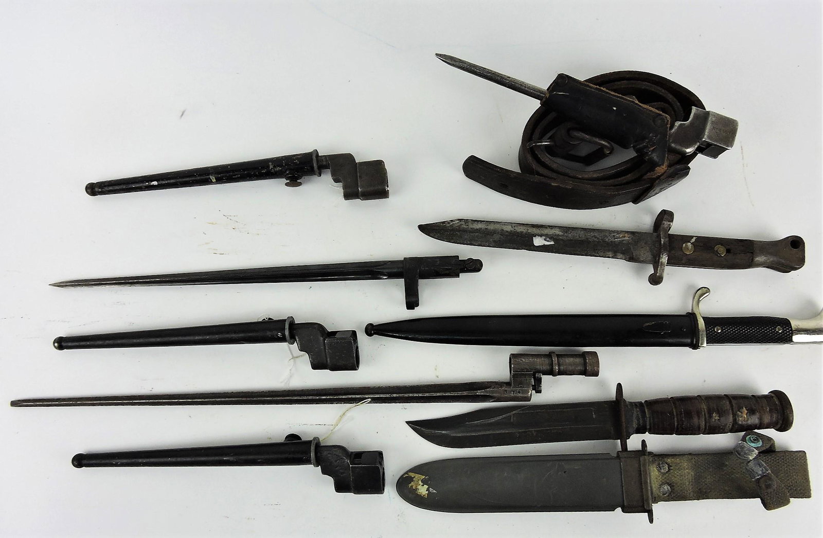 Lot of 9 bayonets, rifle spikes, and: knife