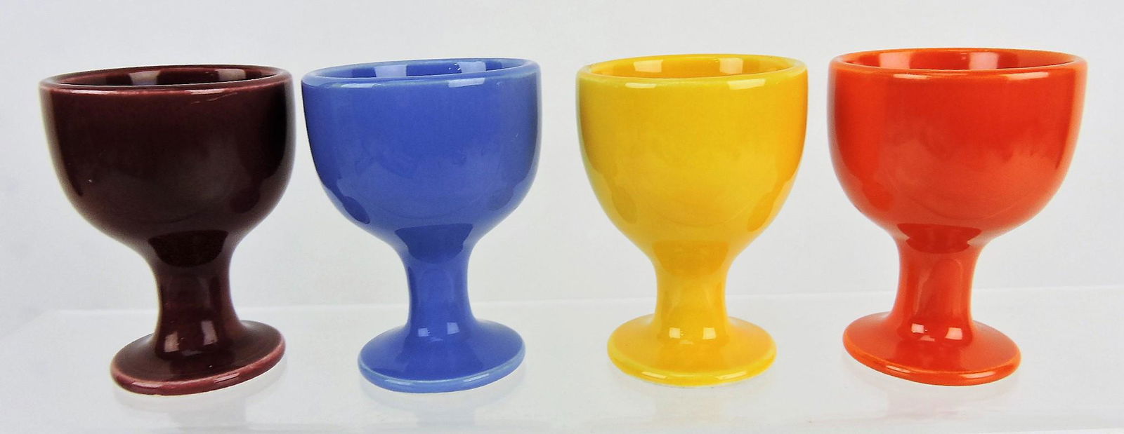 Fiesta Harlequin single egg cup: group of 4; maroon, mauve blue, yellow, red