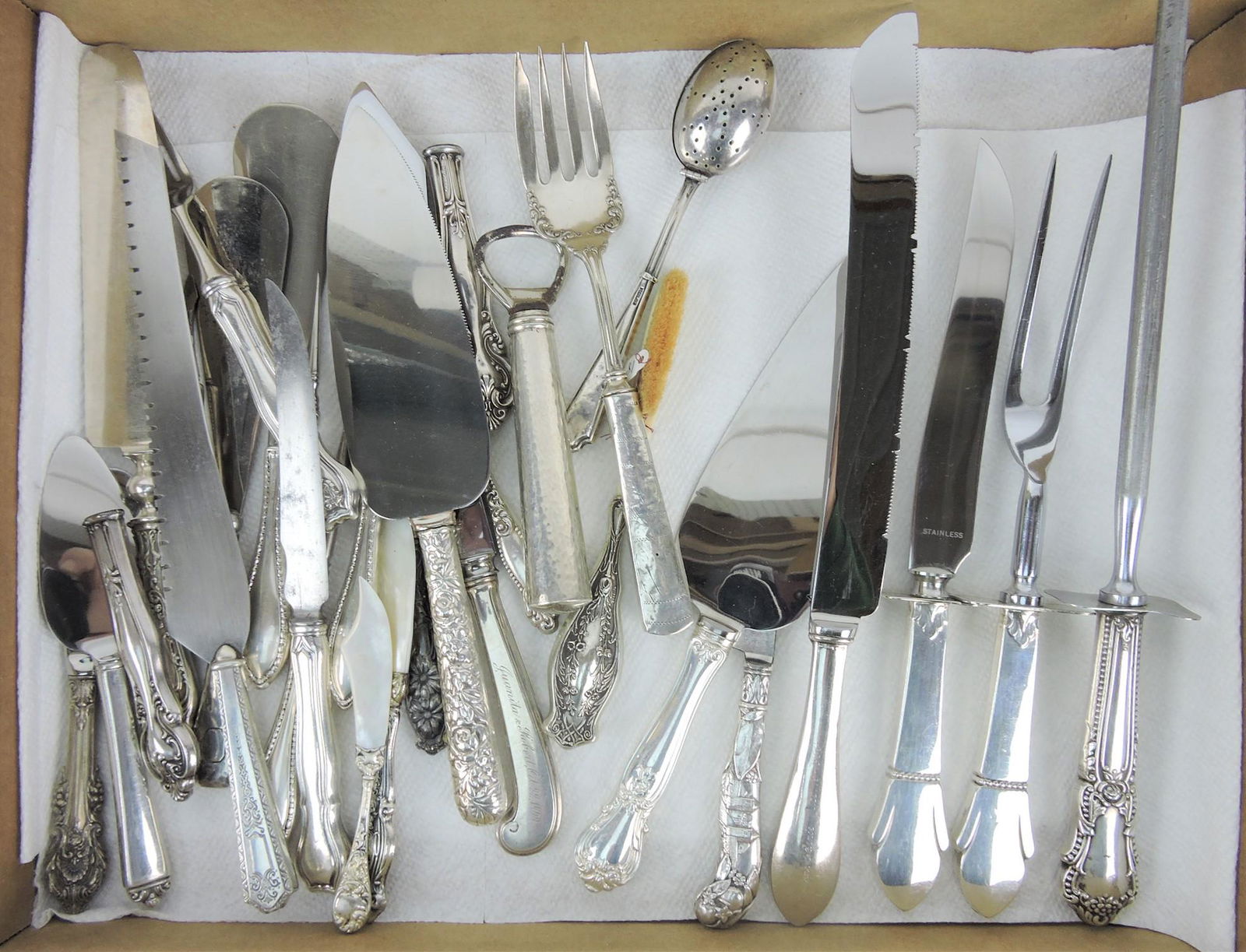 Lot of sterling silver handled serving (1 of 1)