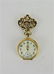 Lady's 18kt gold pendant watch with