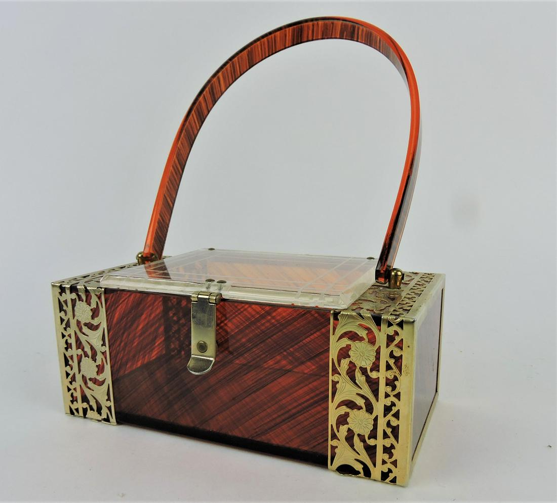 Bakelite lucite tortoise shell style, (1 of 2)