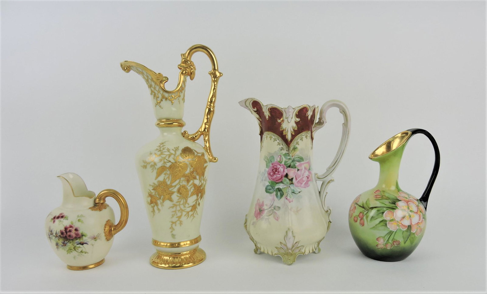 Hand painted lot of 4 ewers, Royal: Worcester, Limoges, and more