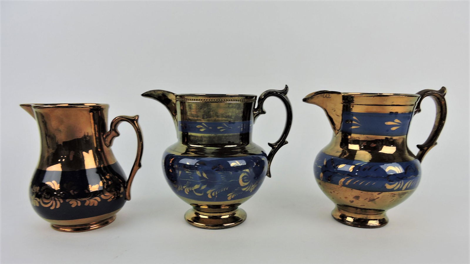 Copper luster lot of 3 pitchers (1 of 1)