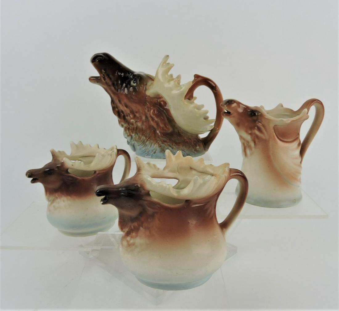 Lot of 4 moose creamers (nick to one): .
