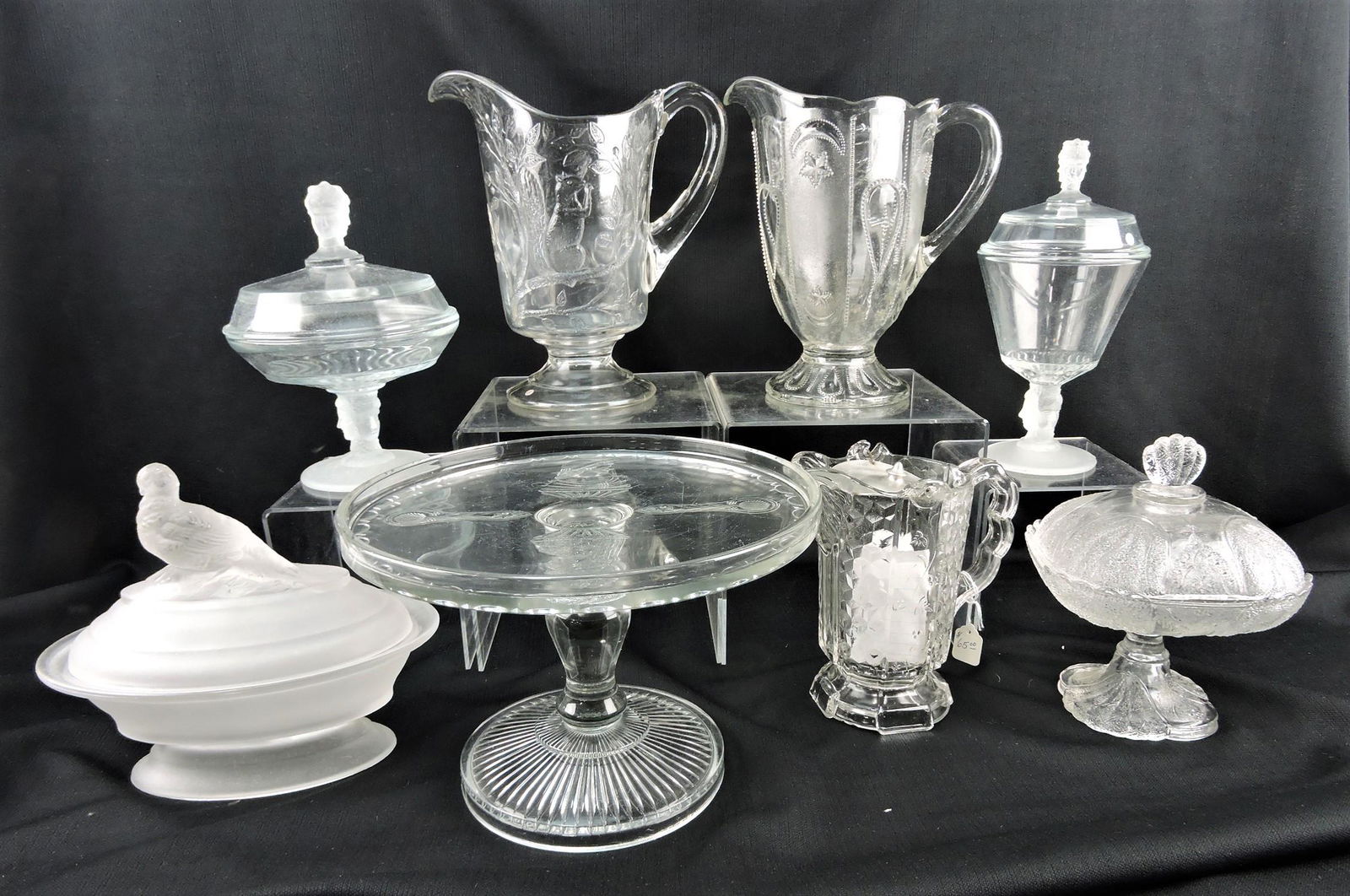 EAPG lot of 8 pieces: 2 - Three Faces: covered jars, Greentown squirrel pitcher, Shrine Moon & Star pitcher, Actress cake stand, shell & tassel covered compote, Honeycomb syrup, frosted bird covered dish