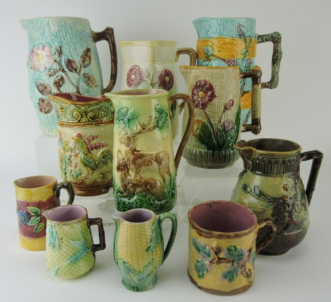 Majolica lot of 10 pitchers and one: mug, various condition