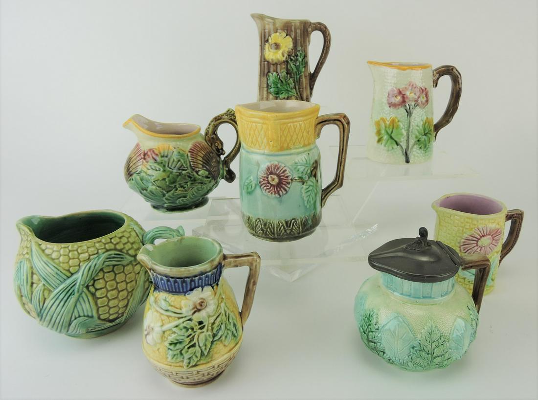 Majolica lot of 8 creamers: .