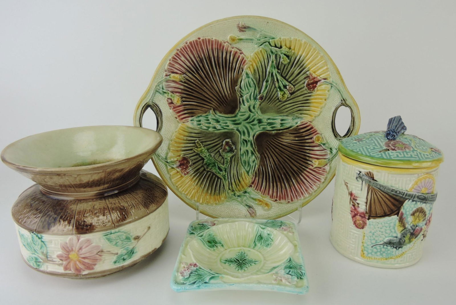 Majolica lot of 4 pieces; spittoon,: humidor, square tray, shell plate - various condition