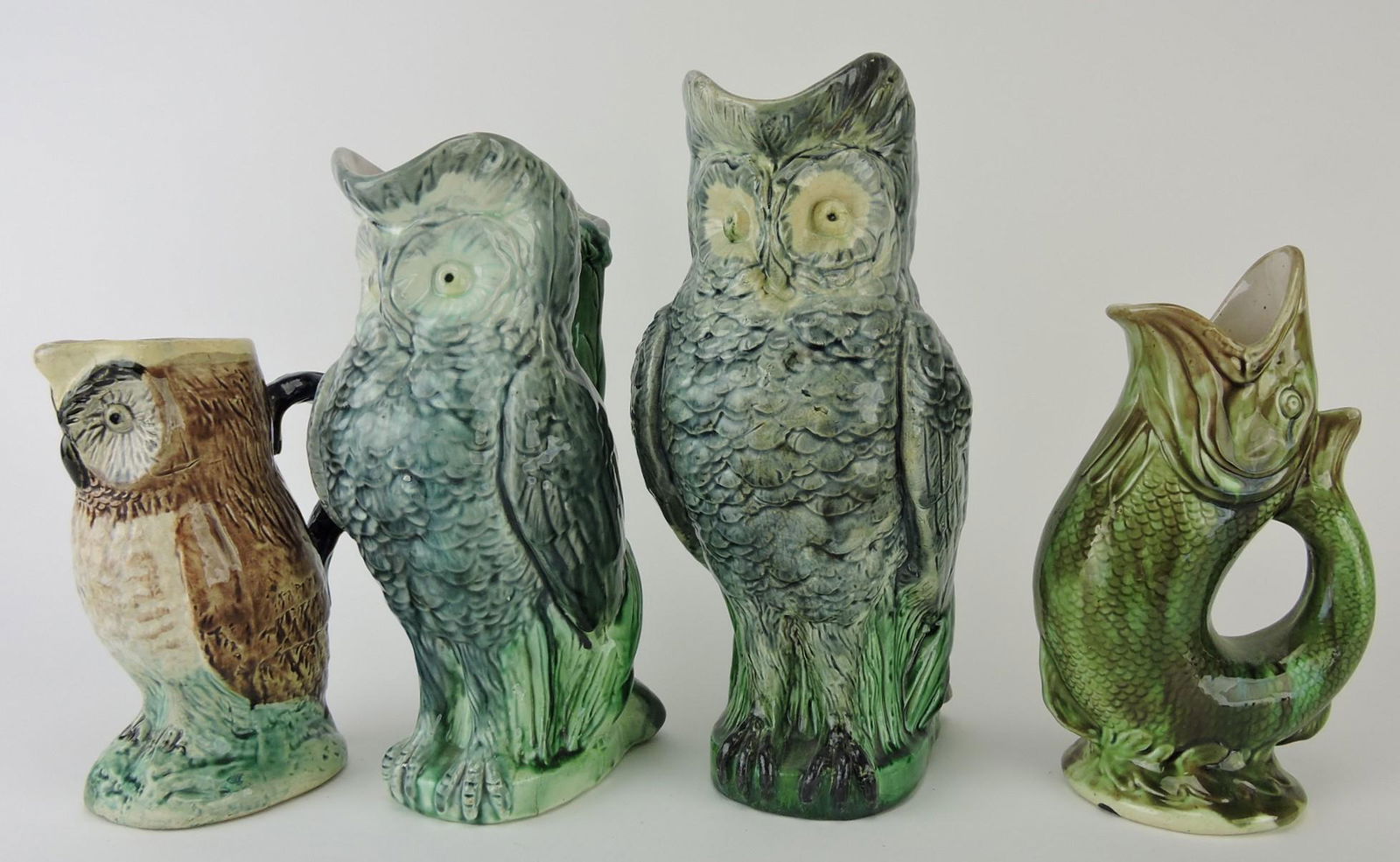 Majolica lot of 4 figural pitchers; (1 of 1)