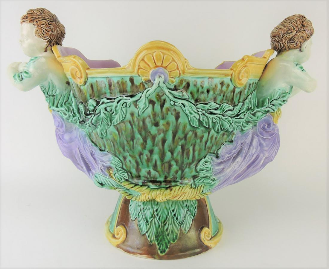 Majolica large jardiniere with cherub: handles, base rim repair, 15"h, 20"w