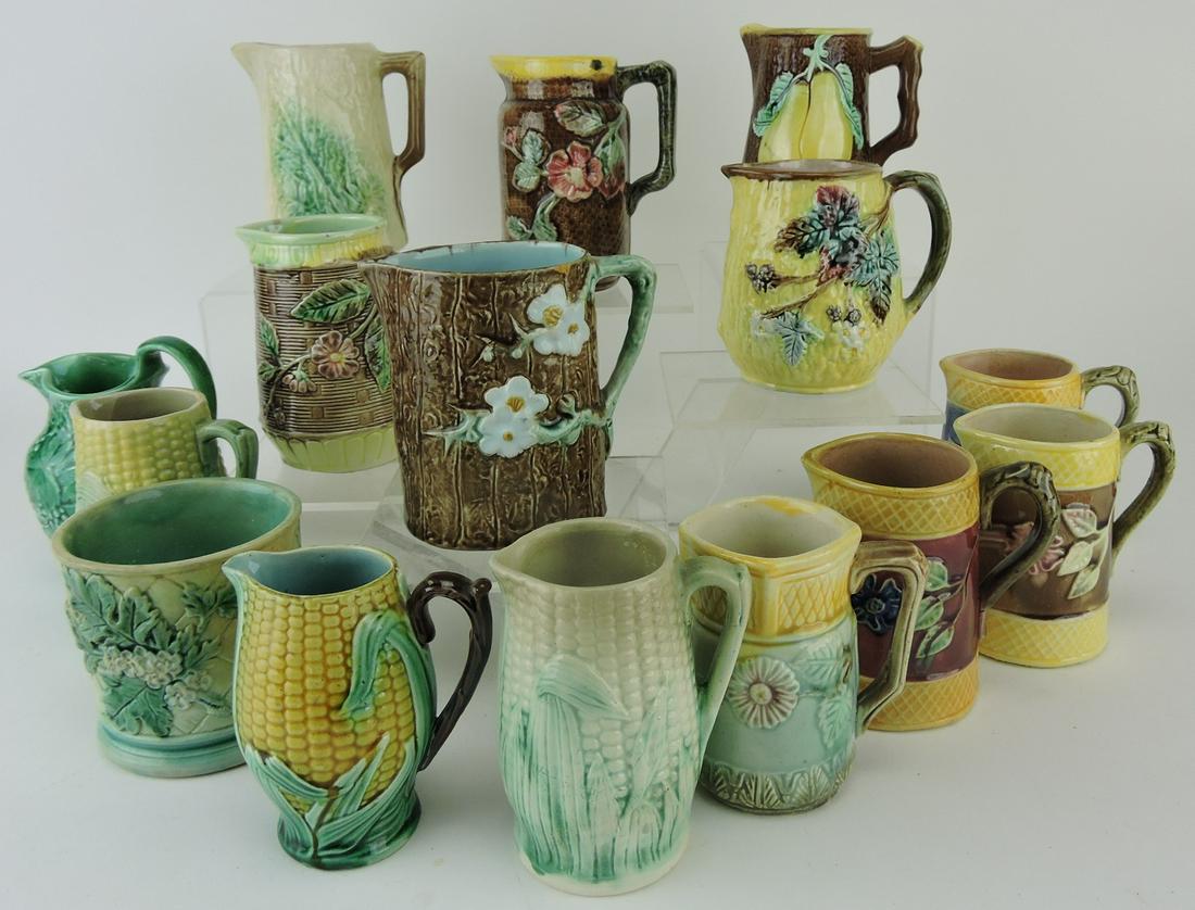 Majolica lot of 14 pitchers and 1 mug, (1 of 1)