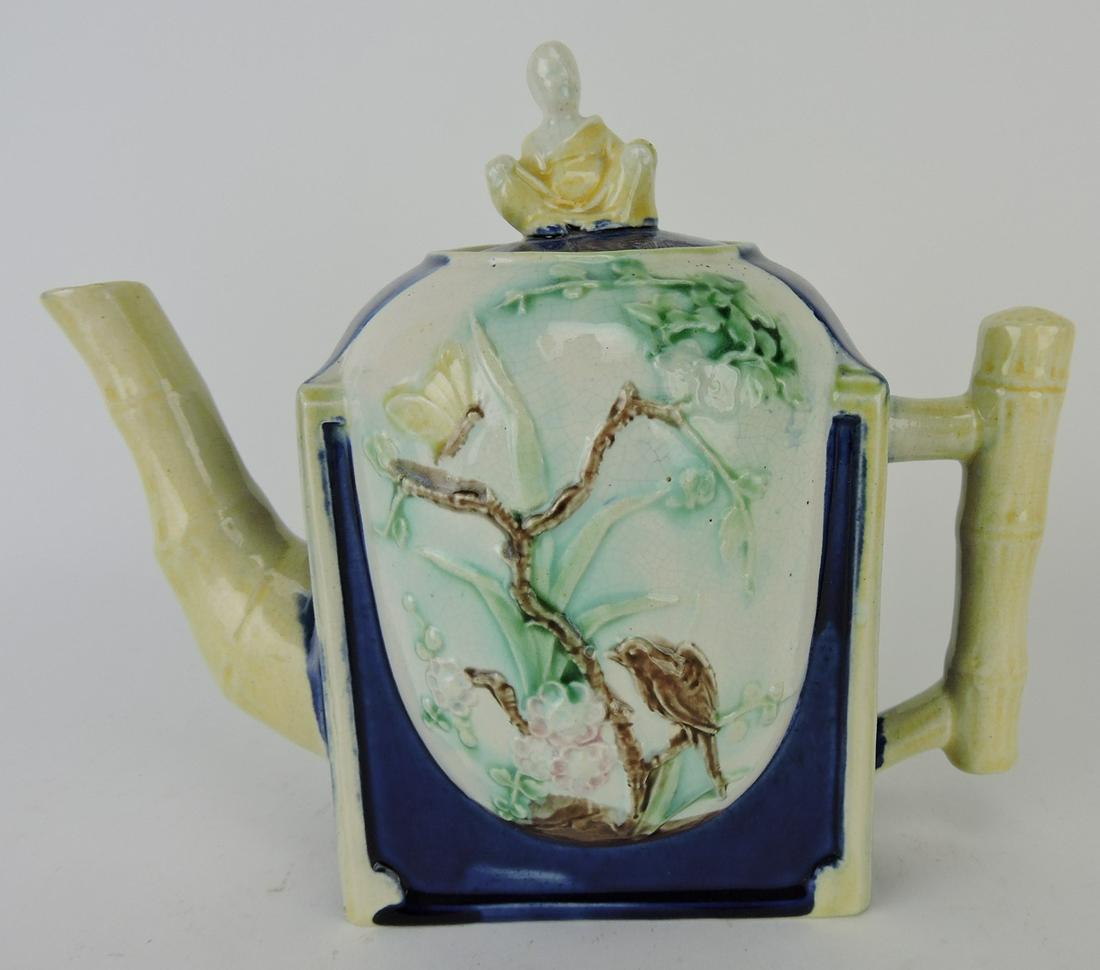 Majolica Oriental teapot with Chinaman: on lid, 7"